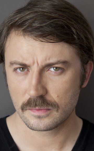 Tolga G&uuml;le&ccedil;